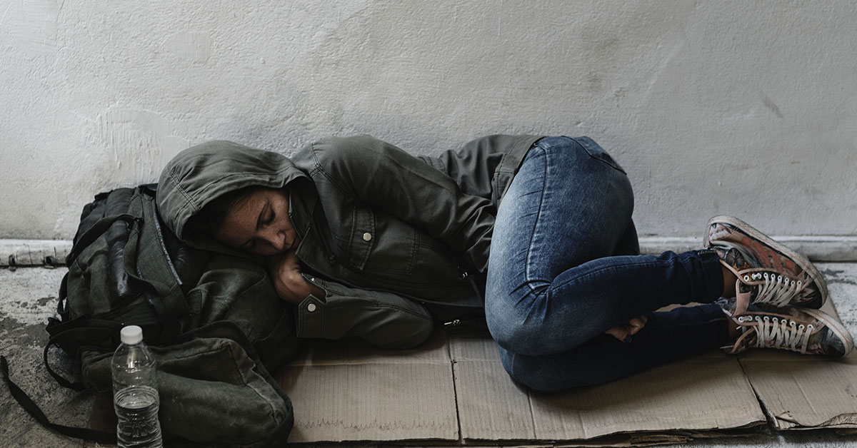 homeless girl sleeping on the street