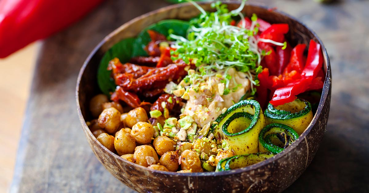 salad with chickpeas, curled zucchini, sprouts and red pepper