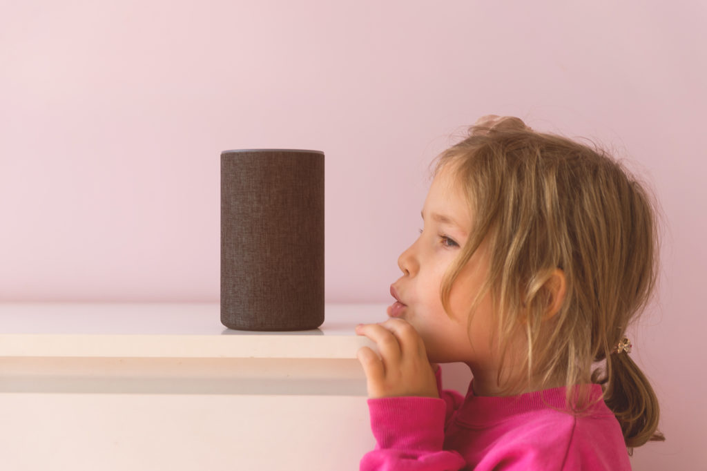 Child speaking to Amazon Alexa 