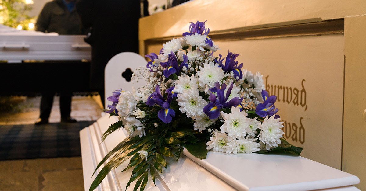 bouquet of flowers on a casket