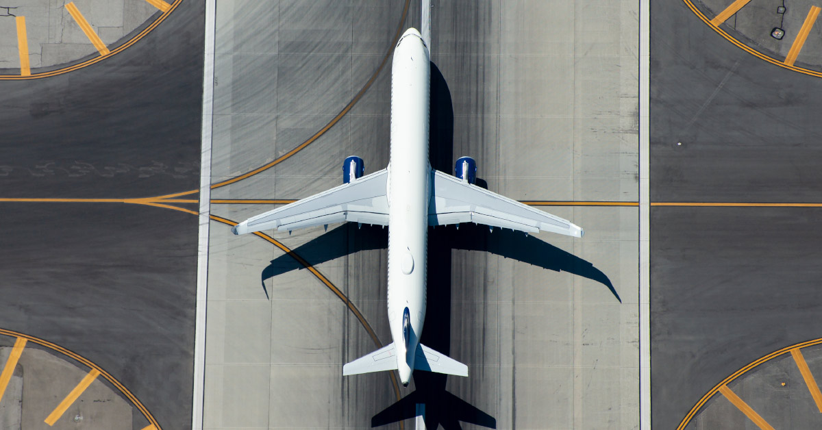 commercial jet seen from above on runway